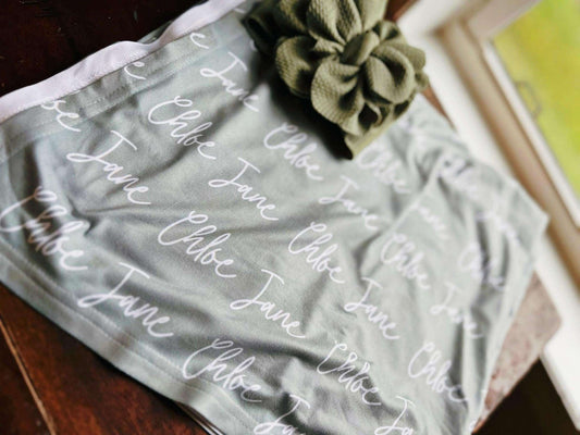 Solid Color Twisty Font Personalized Name Swaddle
